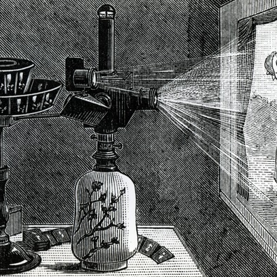 An engraving of a magic lantern setup, with an image of a mother and baby on the screen.