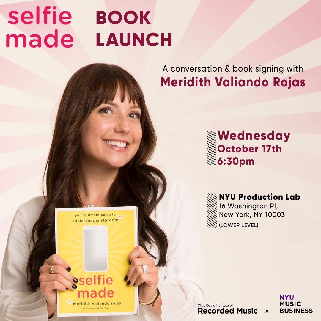 Author Meridith Valiando Rojas holding her new book titled Selfie Made