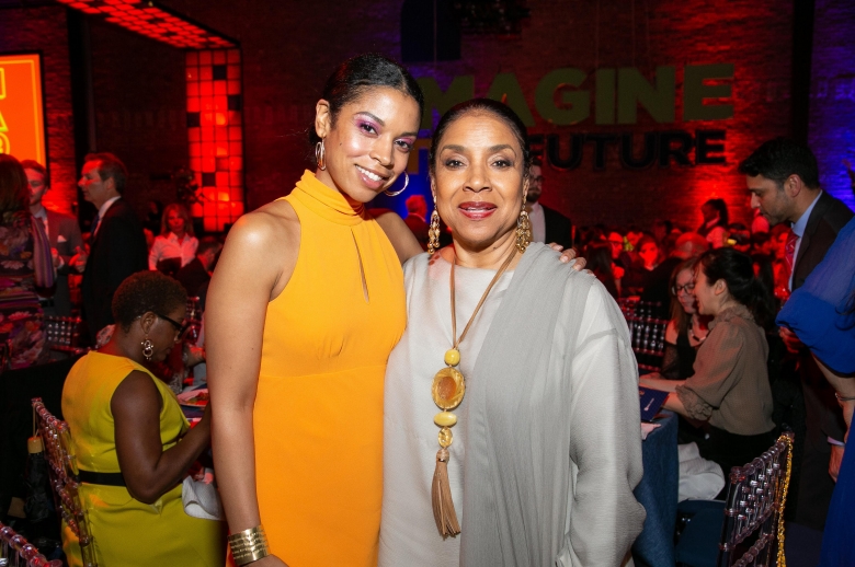 Susan Kelechi Watson in a yellow dress and Phylicia Rashad in a cream top at the 2019 Tisch Gala