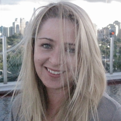 Headshot of Amanda Parkes with windswept hair