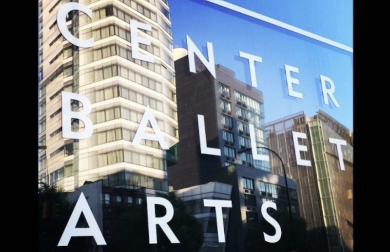 window with words on it reading "Center for Ballet and the Arts"