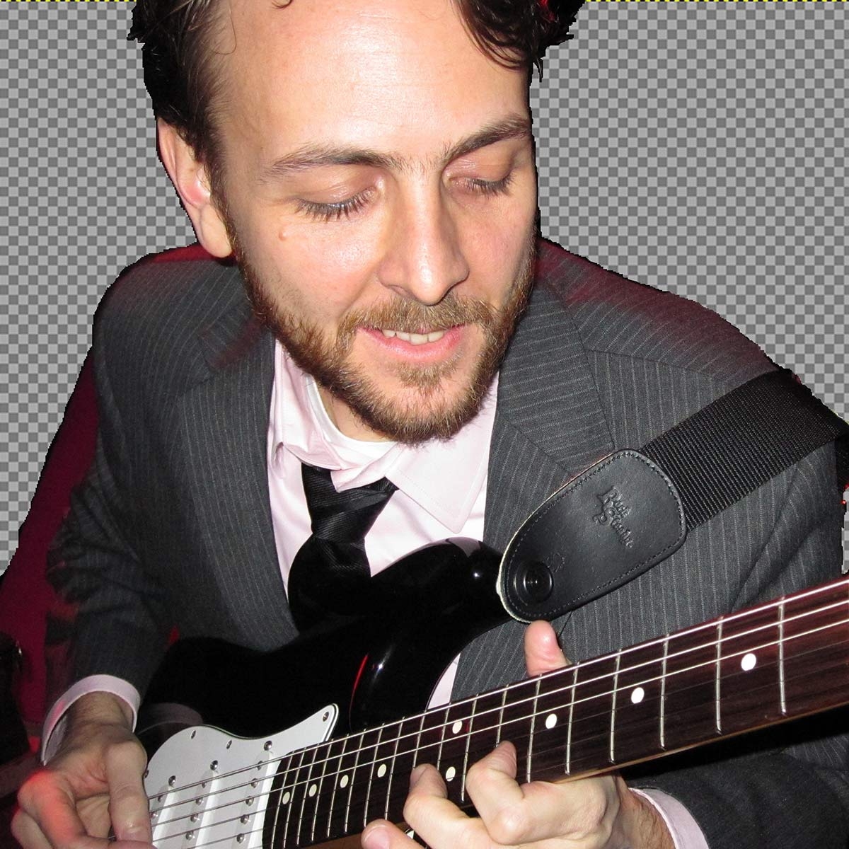 headshot of Karl Ward playing guitar