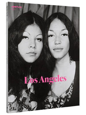 magazine cover. text "Los Angeles" over black and white photograph of two women.