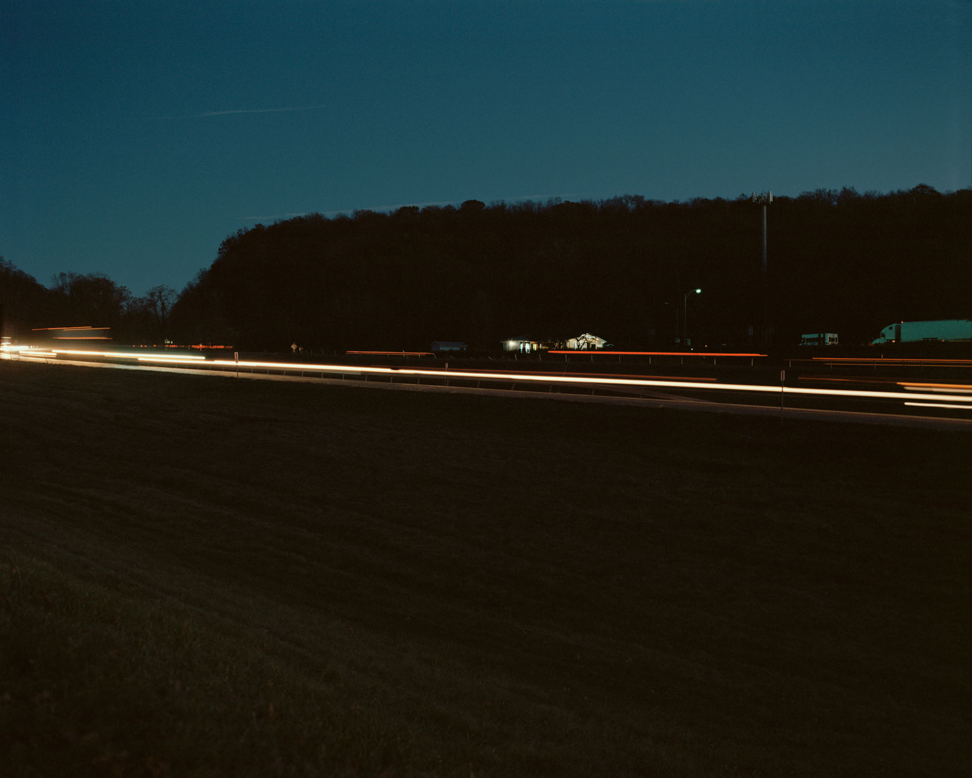 light trails from moving cars at night