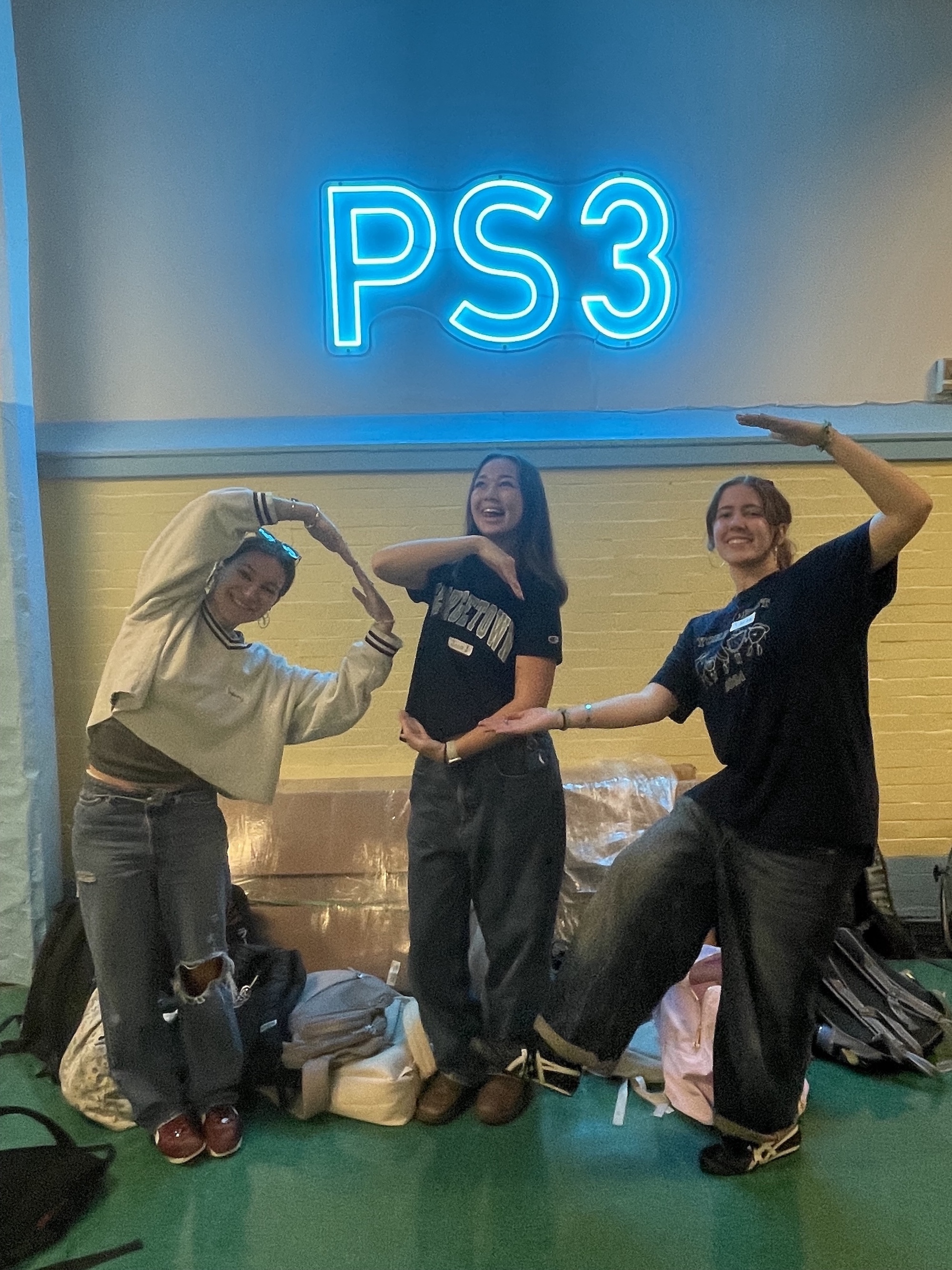 Collaborative Arts students: Sydney Benjamin, Jojo Wren, and Sarah Zaruba posing at PS3