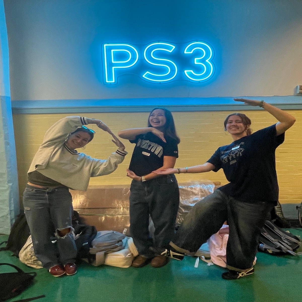 Collaborative Arts students: Sydney Benjamin, Jojo Wren, and Sarah Zaruba posing at PS3