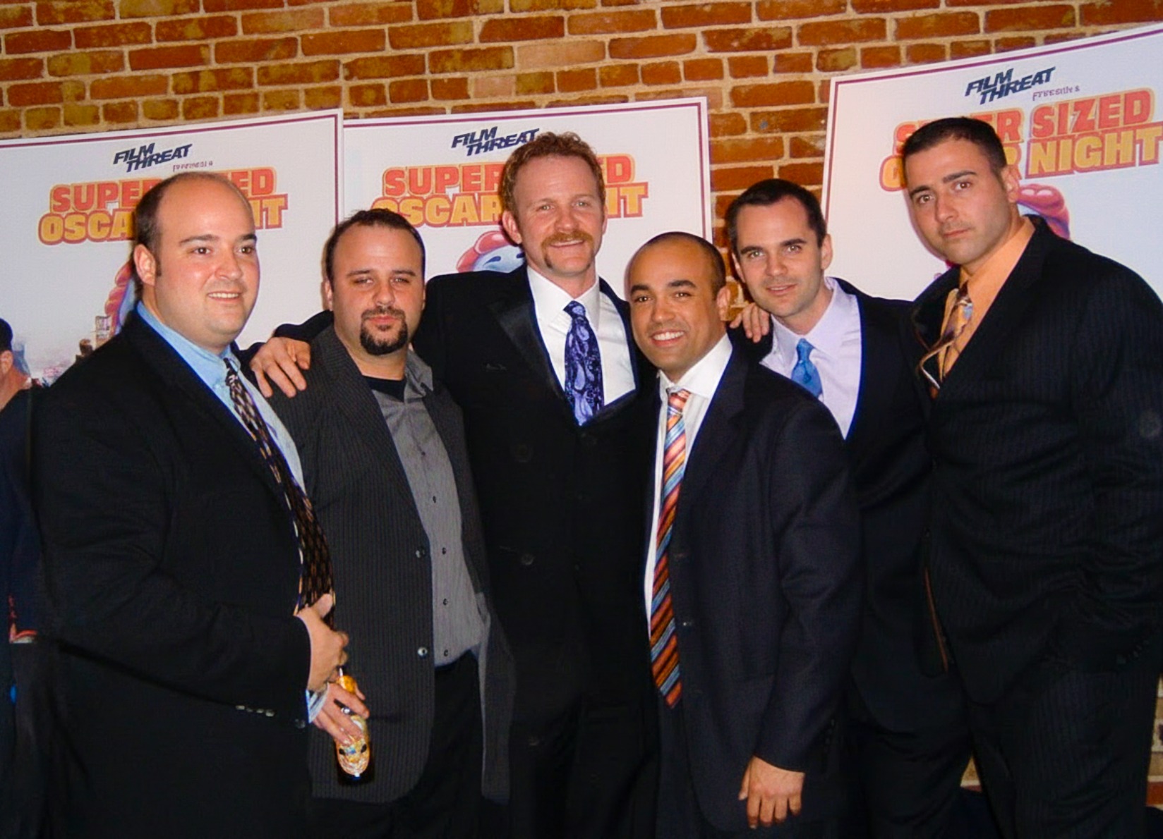 A.J. with friend & fellow alumnus Morgan Spurlock at Super Size Me Oscar Nomination Party