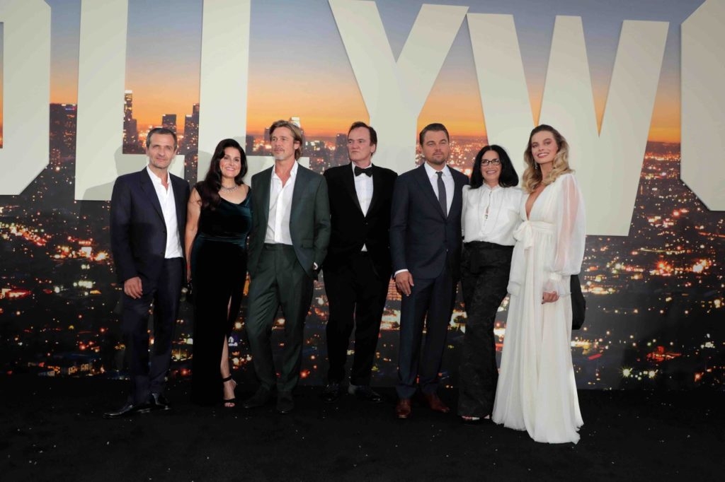 From left, David Heyman, Shannon McIntosh, Brad Pitt, Quentin Tarantino, Leonardo DiCaprio, Georgia Kacandes '85, and Margot Robbie