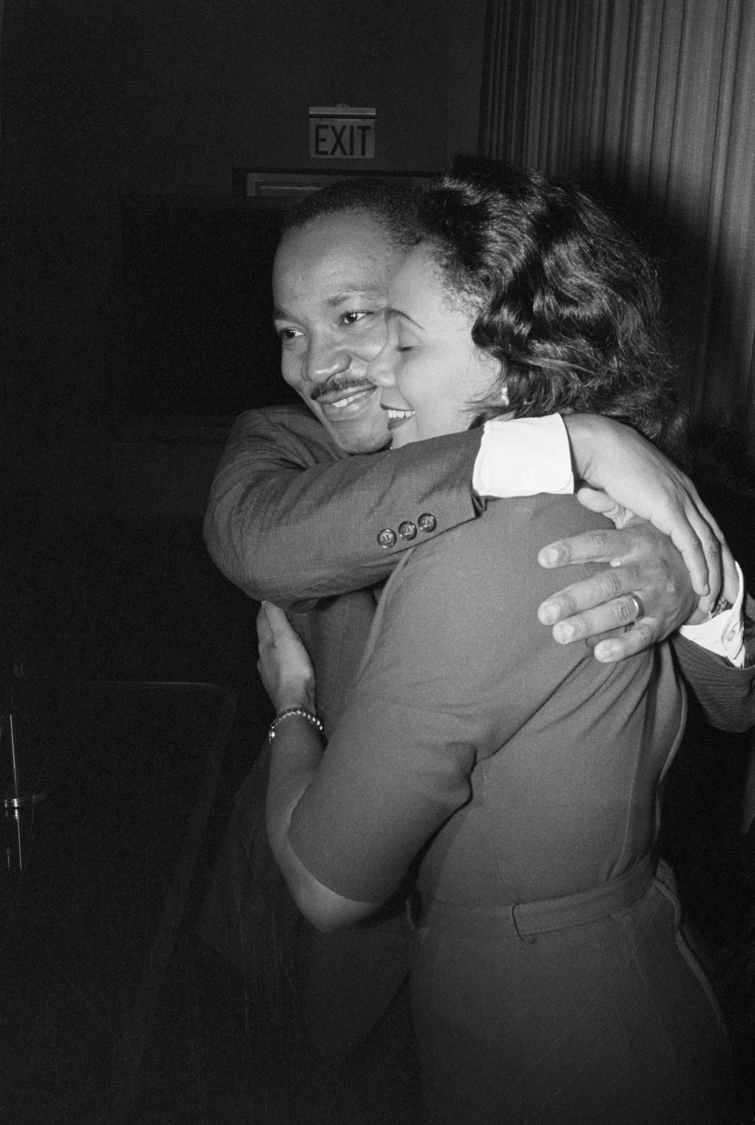 Photo of Martin Luther King, Jr. and Coretta Scott hugging after King won a Nobel Peace Prize in 1964.