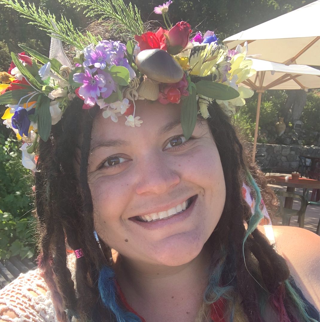 A profile photo of Alexis Acosta wearing a flower crown.