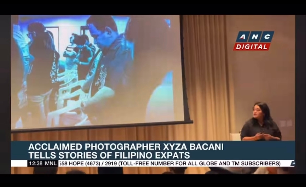Xyza Cruz Bacani on ANC News. The text reads "acclaimed photographer Xyza Cruz Bacani tells stories of Filipino expats"