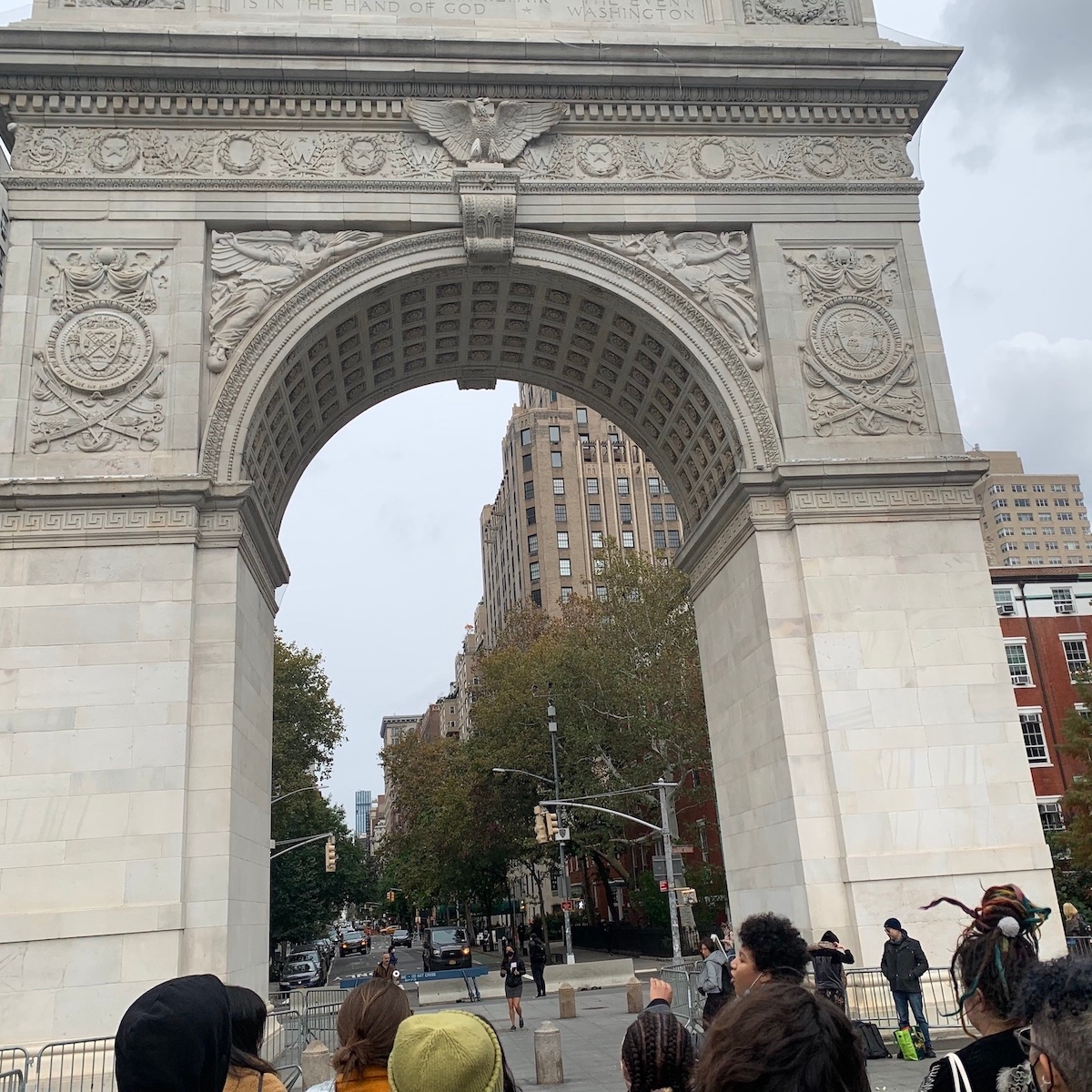 A picture of members of the APP 2022 cohort looking at the Washington Square Park arch.