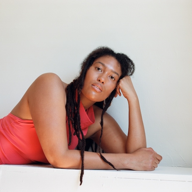 Sienna Fekete in pink shirt