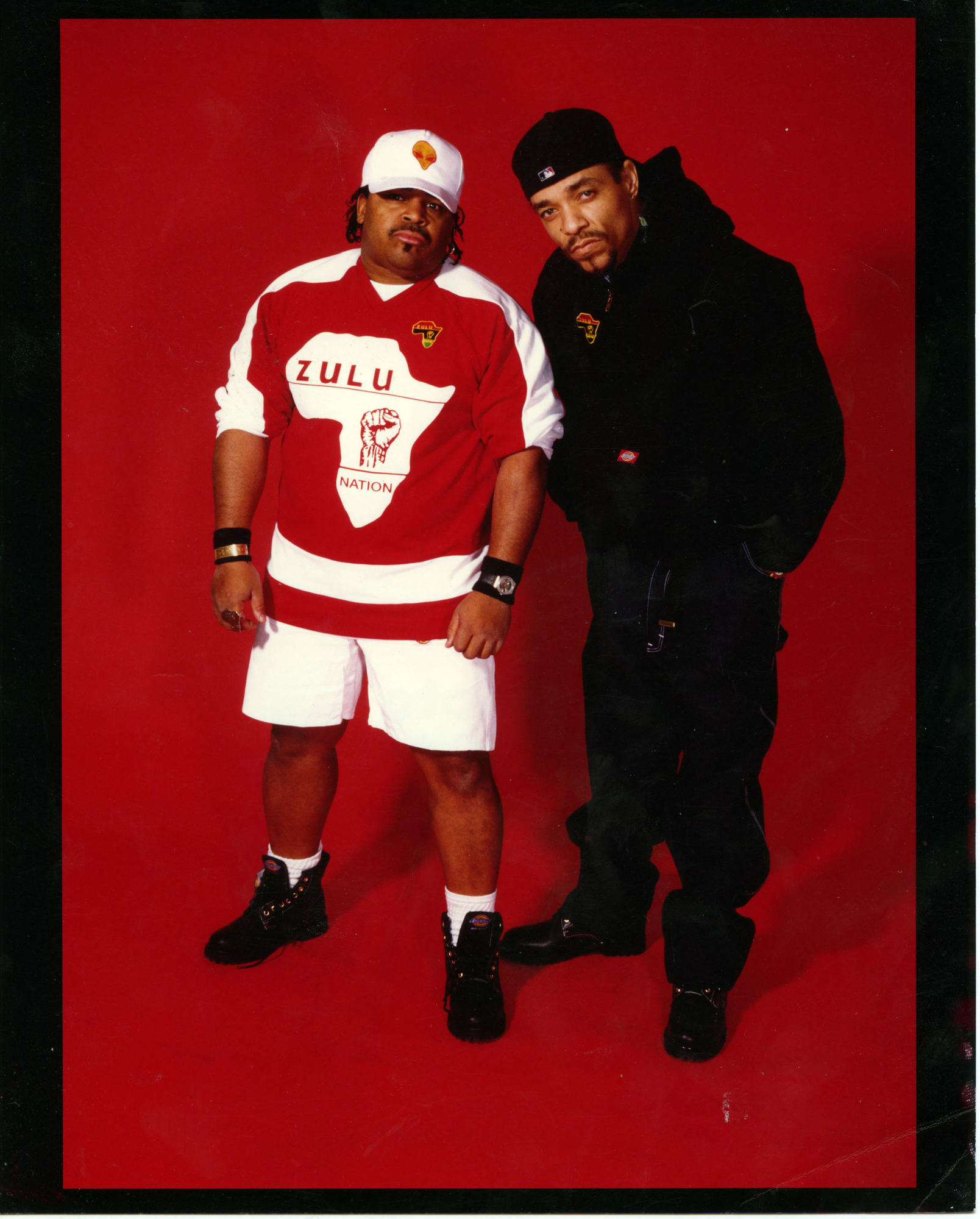  IceT and Afrika Islam photo against red background