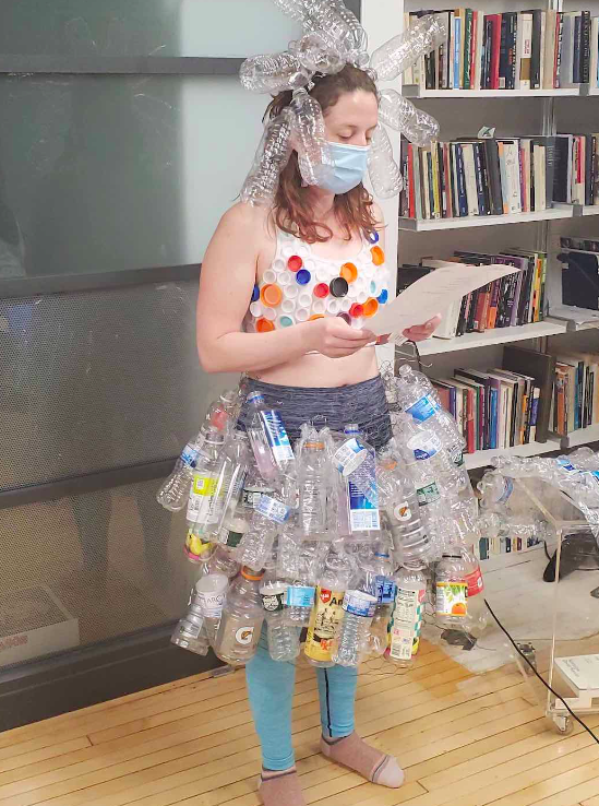 Felicia Avalos in dress made of water bottles titled Runway to the Border