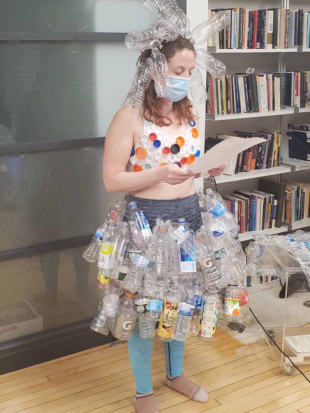 A picture of Arts Politics student Felicia Avalos wearing a skirt made of water bottles.