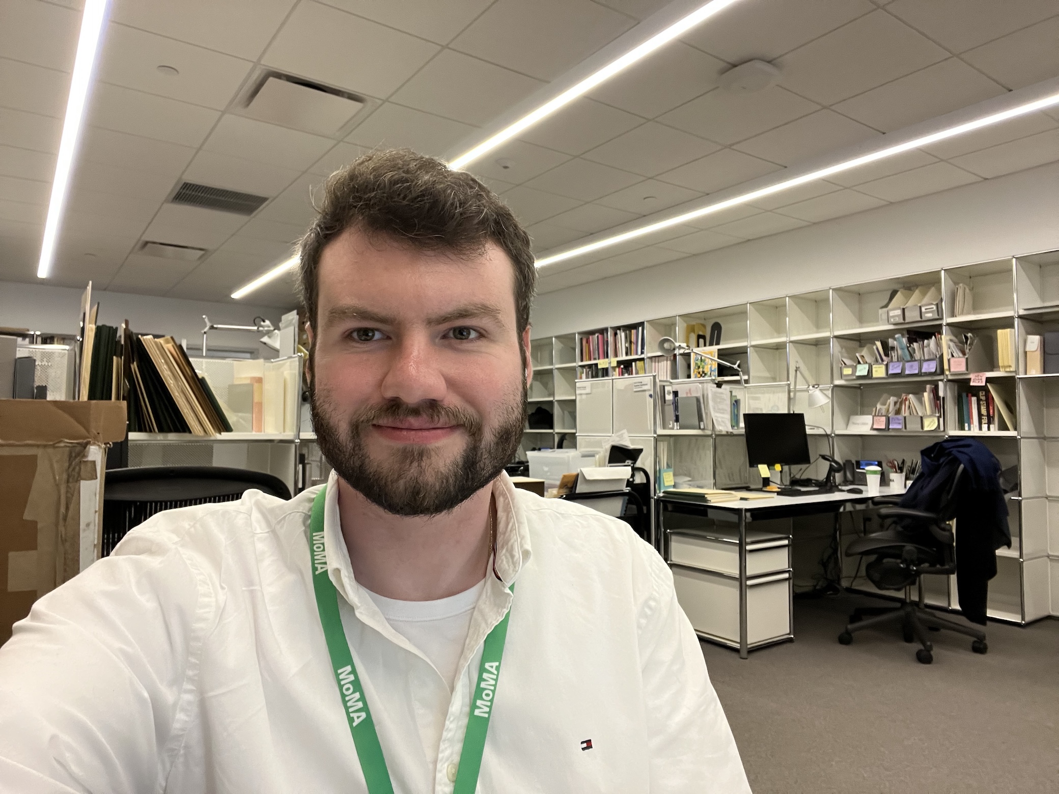 person standing a selfie in an office