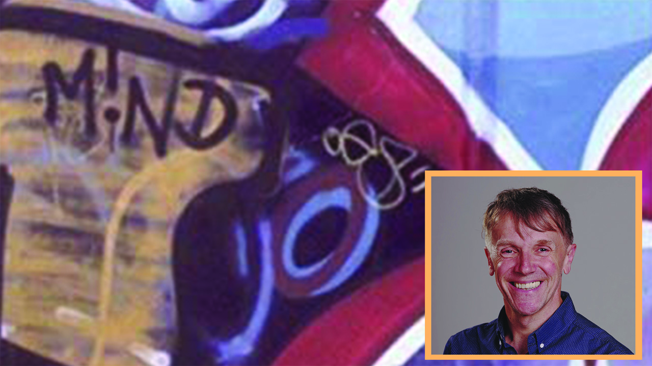 Picture of the author and background of wall graffiti