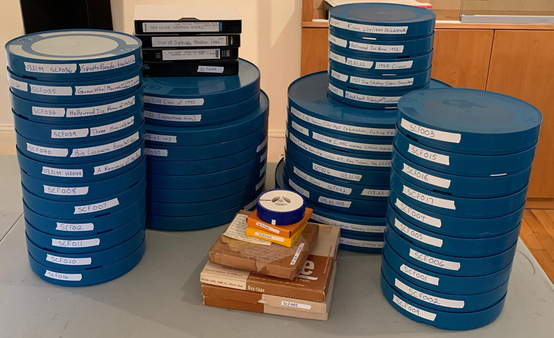 stack of blue film canisters