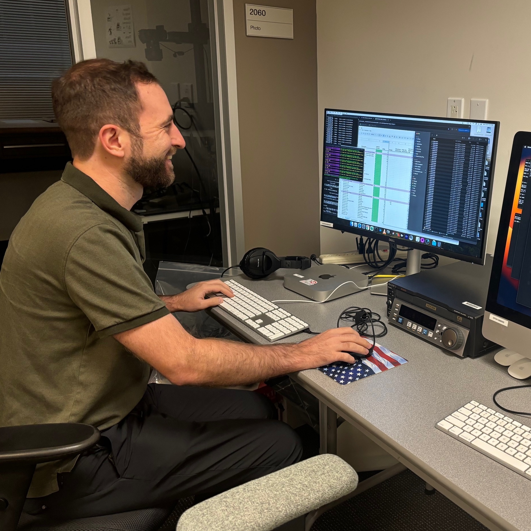 person working at a computer desktop