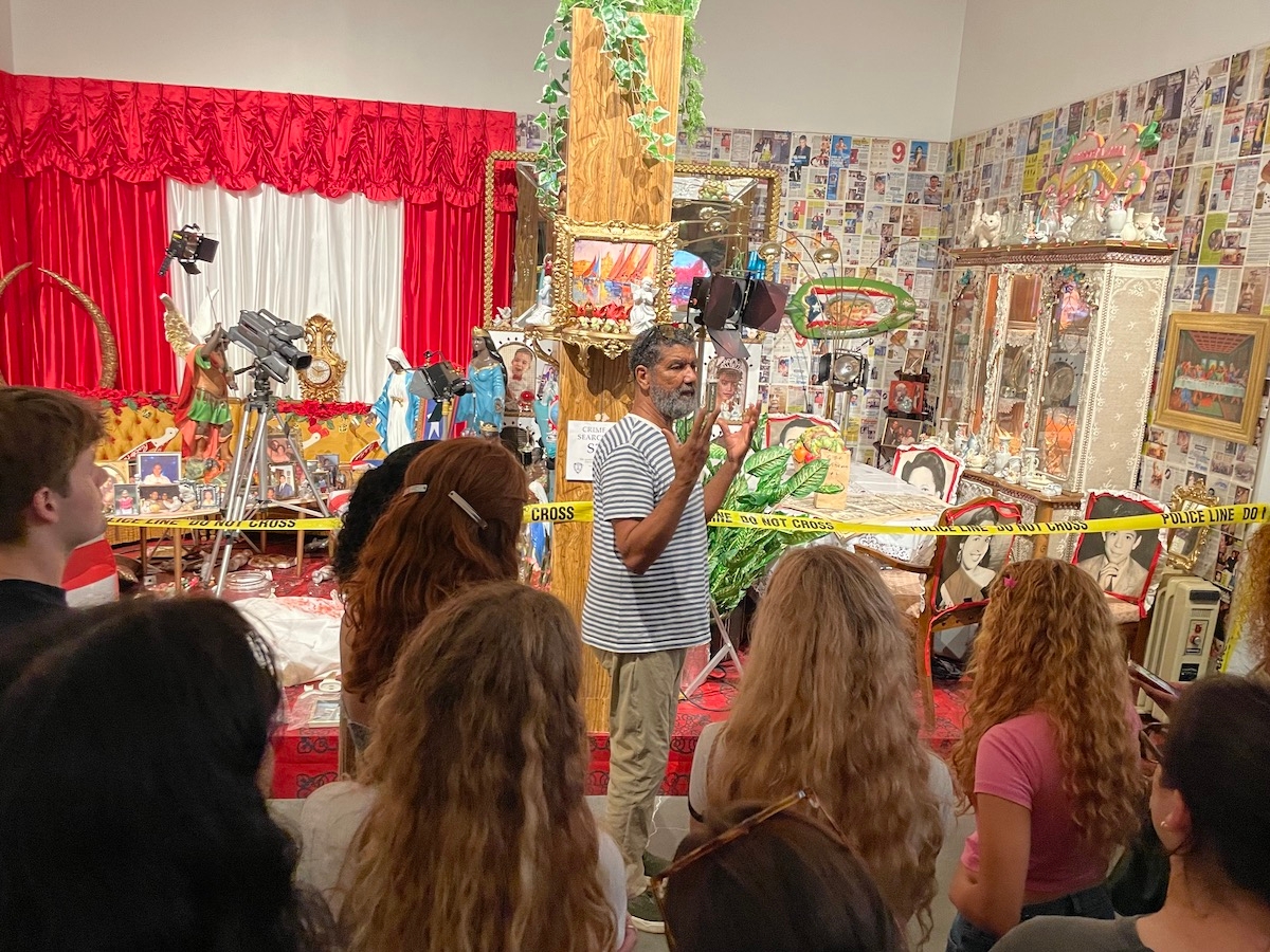 Students view Pepon Osario's work in a gallery