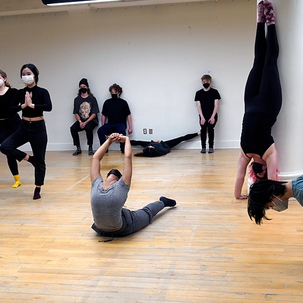 Students doing movement exercise in studio space