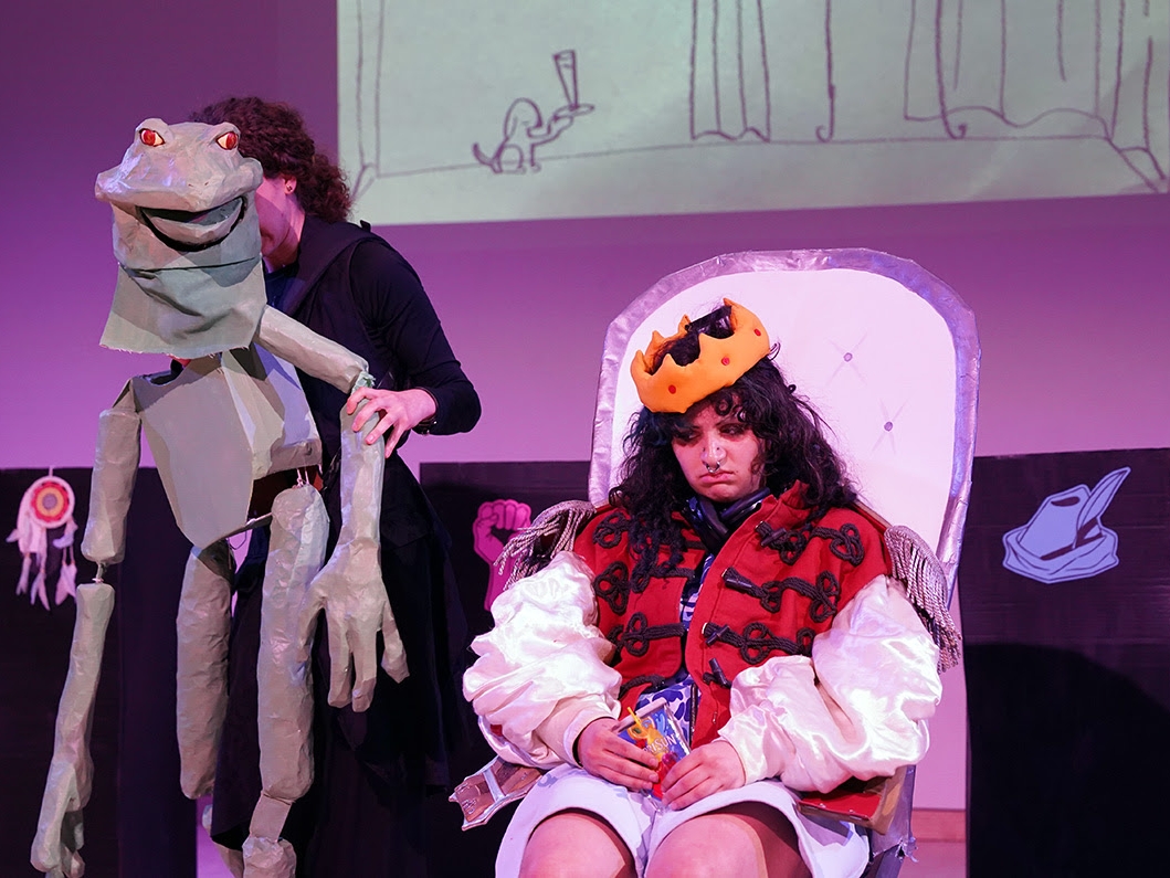 Students performing in costumes 