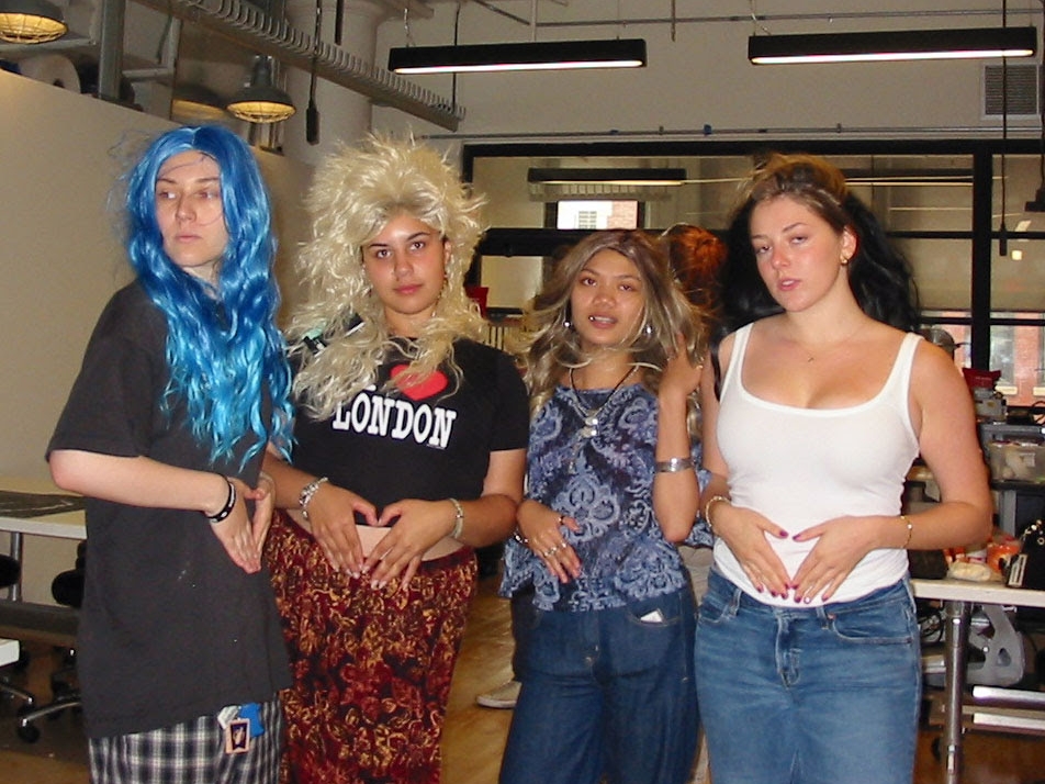  Students posing in wigs