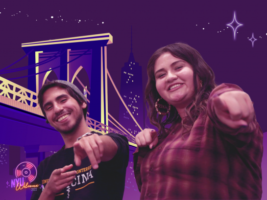 Two students on OGI backdrop pointing at the camera