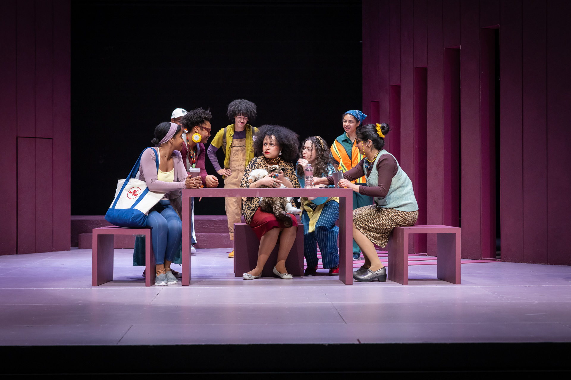 a group of people sitting around a table