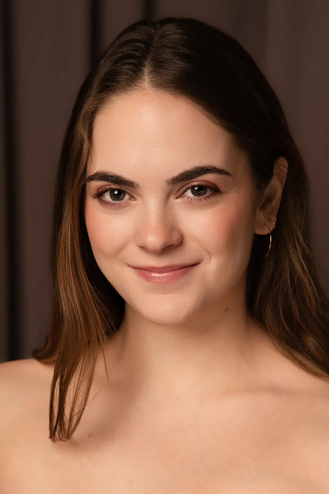 Headshot of student with long brown hair