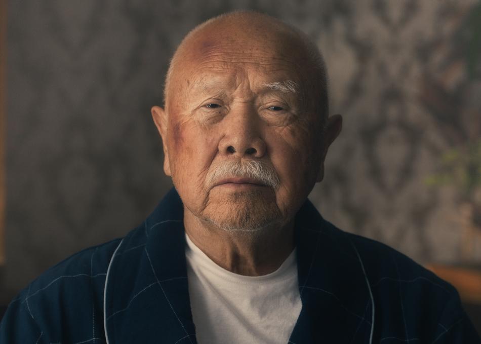 Still from Film, Kimchi. Image of old man from shoulders up.