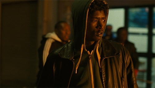Image of a young man in a hoodie looking upset.