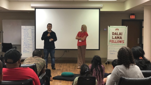 Sean Kim speaks in front of a crowd