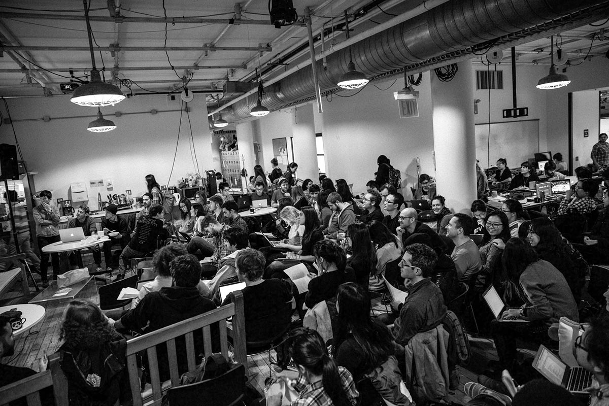 Students gathered in ITP Lounge listening to presentation