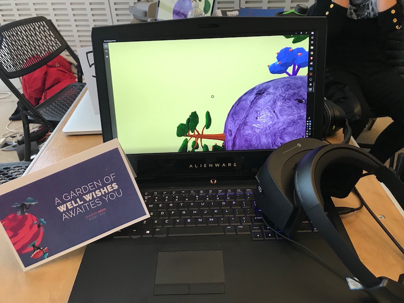 image of a laptop with AR equipment and gARden cards on the screen