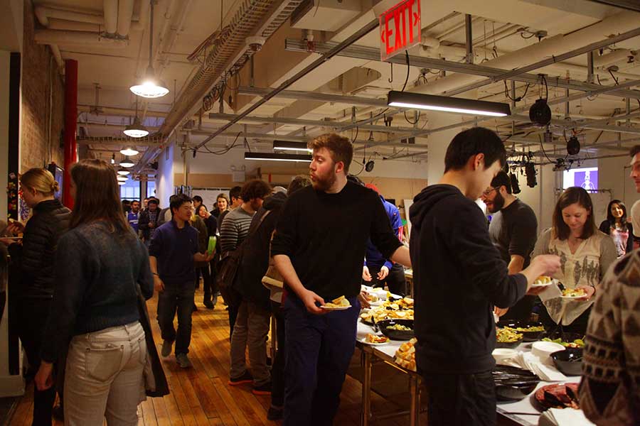Students eating at the ITP Welcome Party