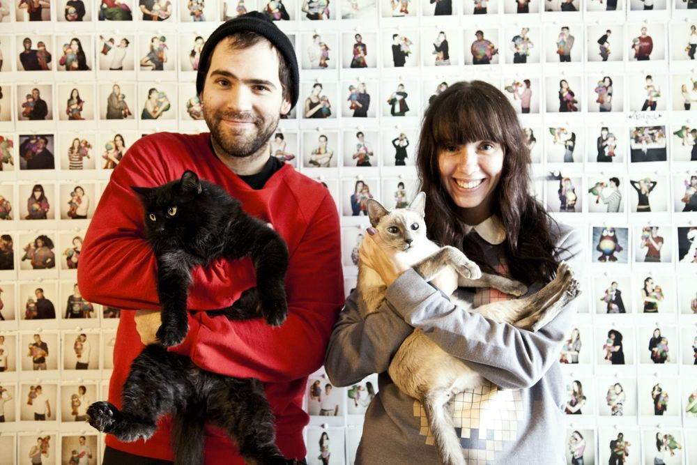 Photo of Reed and Rader with cats