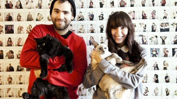 Photo of Reed and Rader with cats
