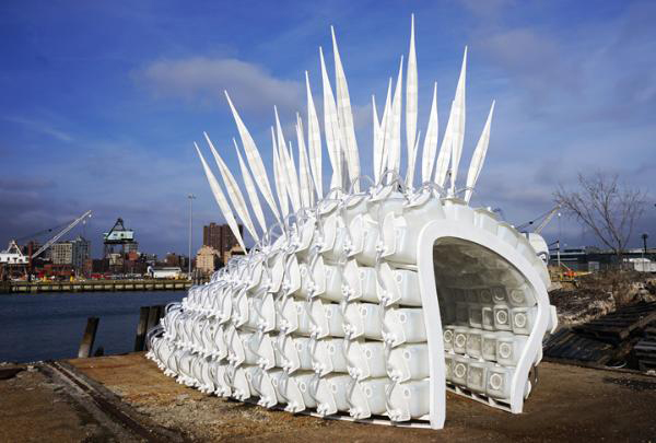 A spiky built sculpture that a person can walk through