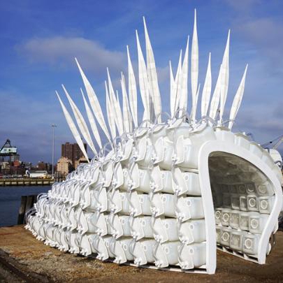 A spiky built sculpture that a person can walk through