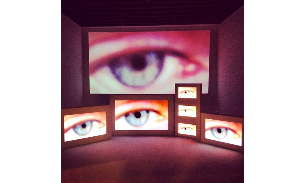 Photo of the same eye on several screens