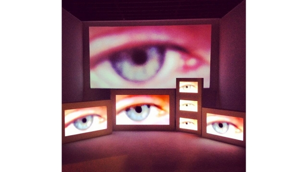 Photo of the same eye on several screens