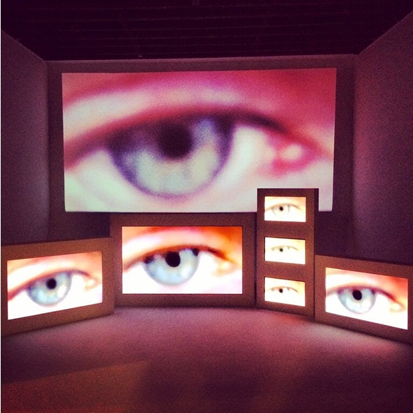 Photo of the same eye on several screens