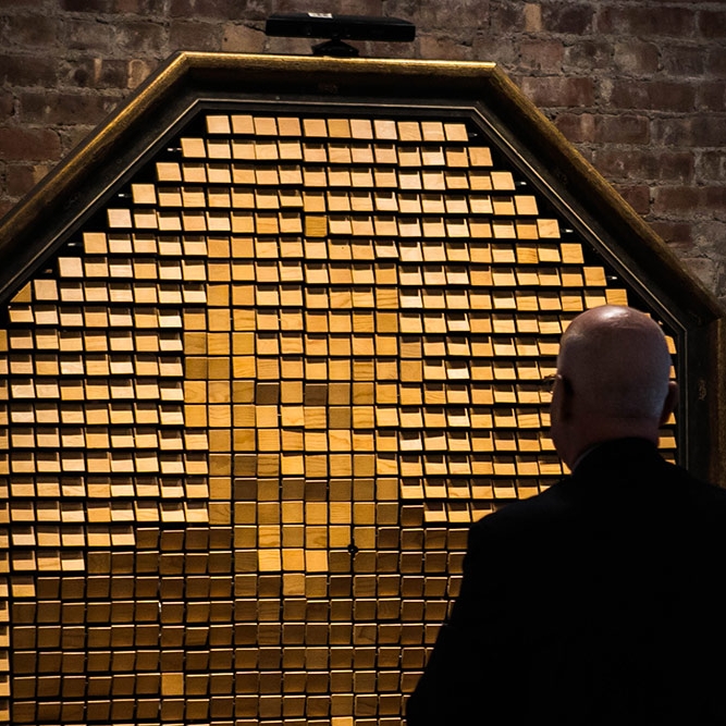 Image of someone in front of the ITP wooden mirror