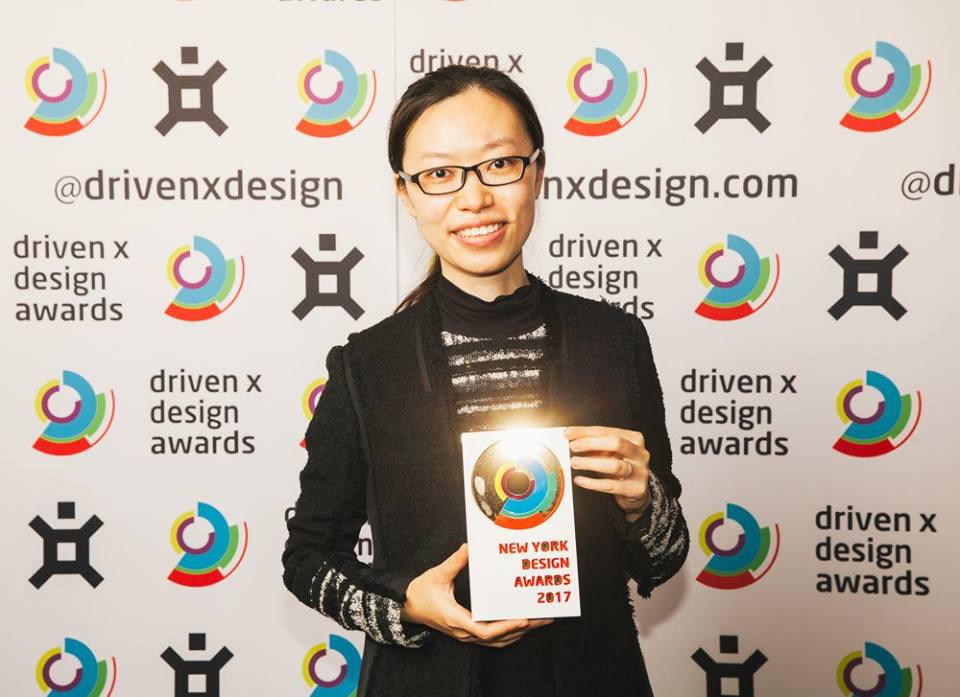 alum shows her prize from the NY Design Awards