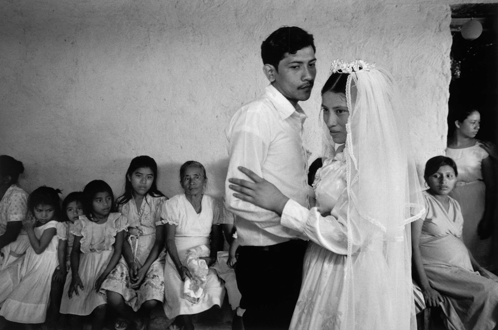 Wedding reception in the countryside, Santiago Nonualco, El Salvador, 1983.CreditSusan Meiselas/Magnum Photos