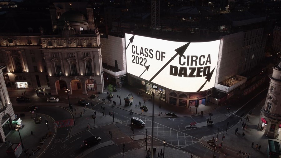 Piccadilly Lights in London displaying "Class of 2022 Circa Dazed"
