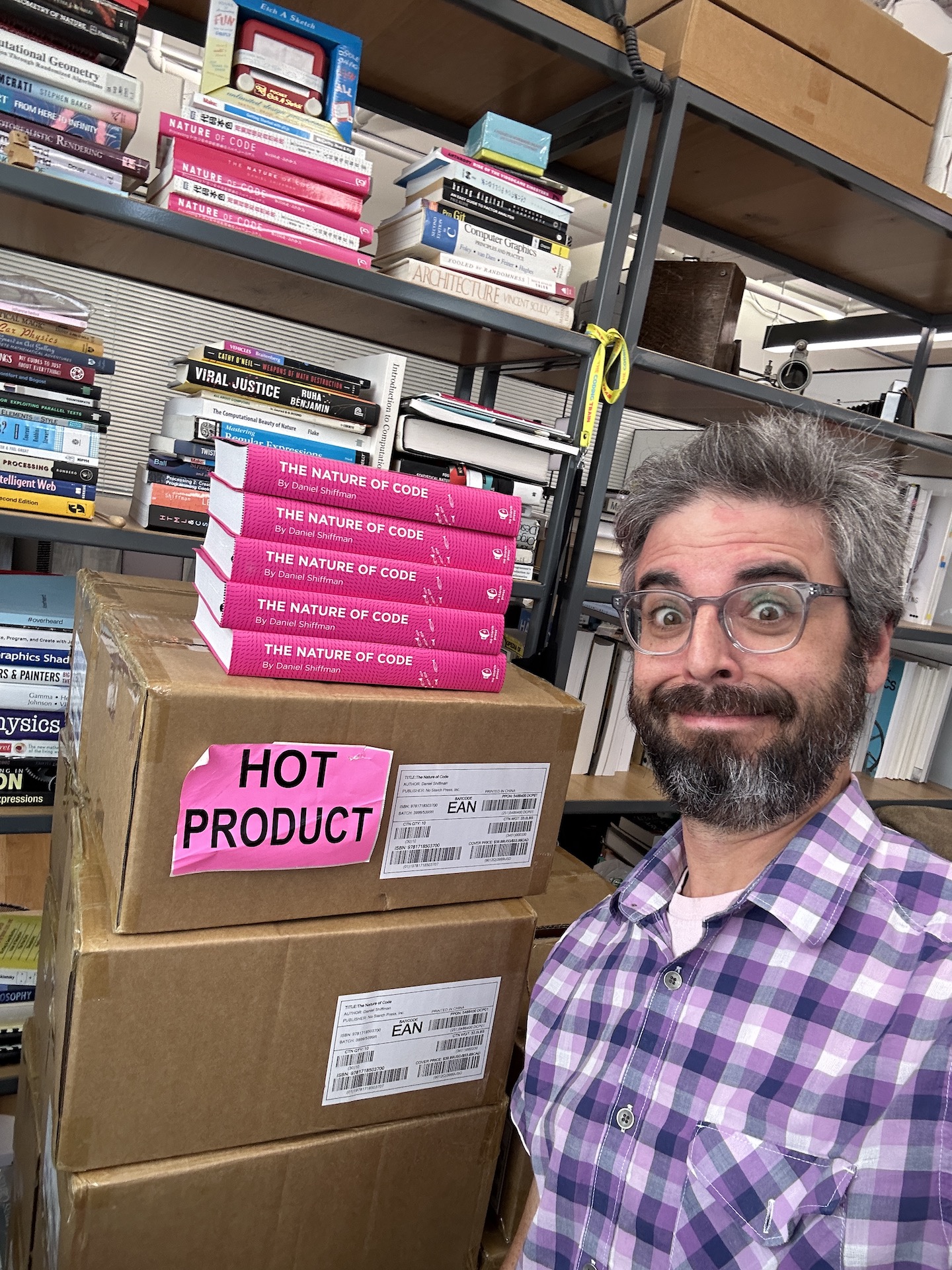 Shiffman with a stack of books