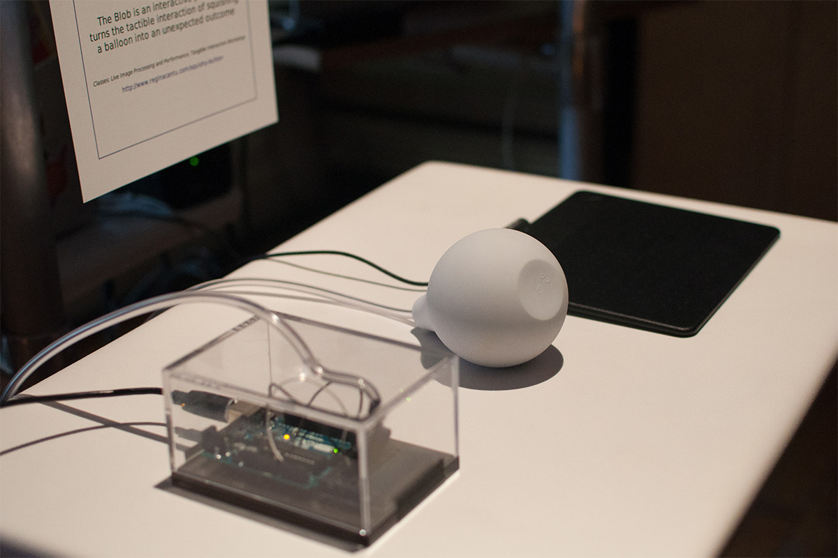 a white blob, and an Arduino encased in a clear case